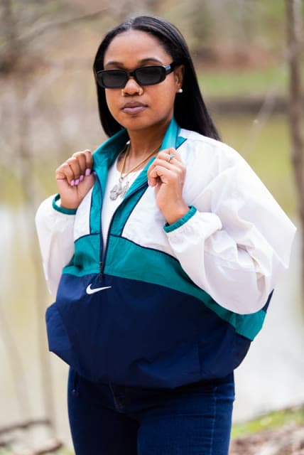 Personal brand session, close portrait in the same windbreaker.