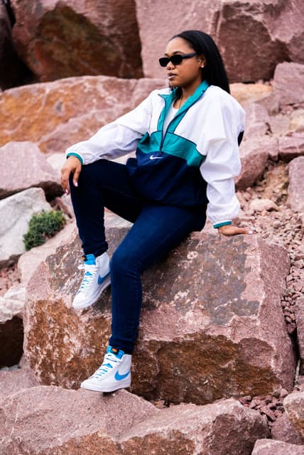 Personal brand session, seated on the same rocks.